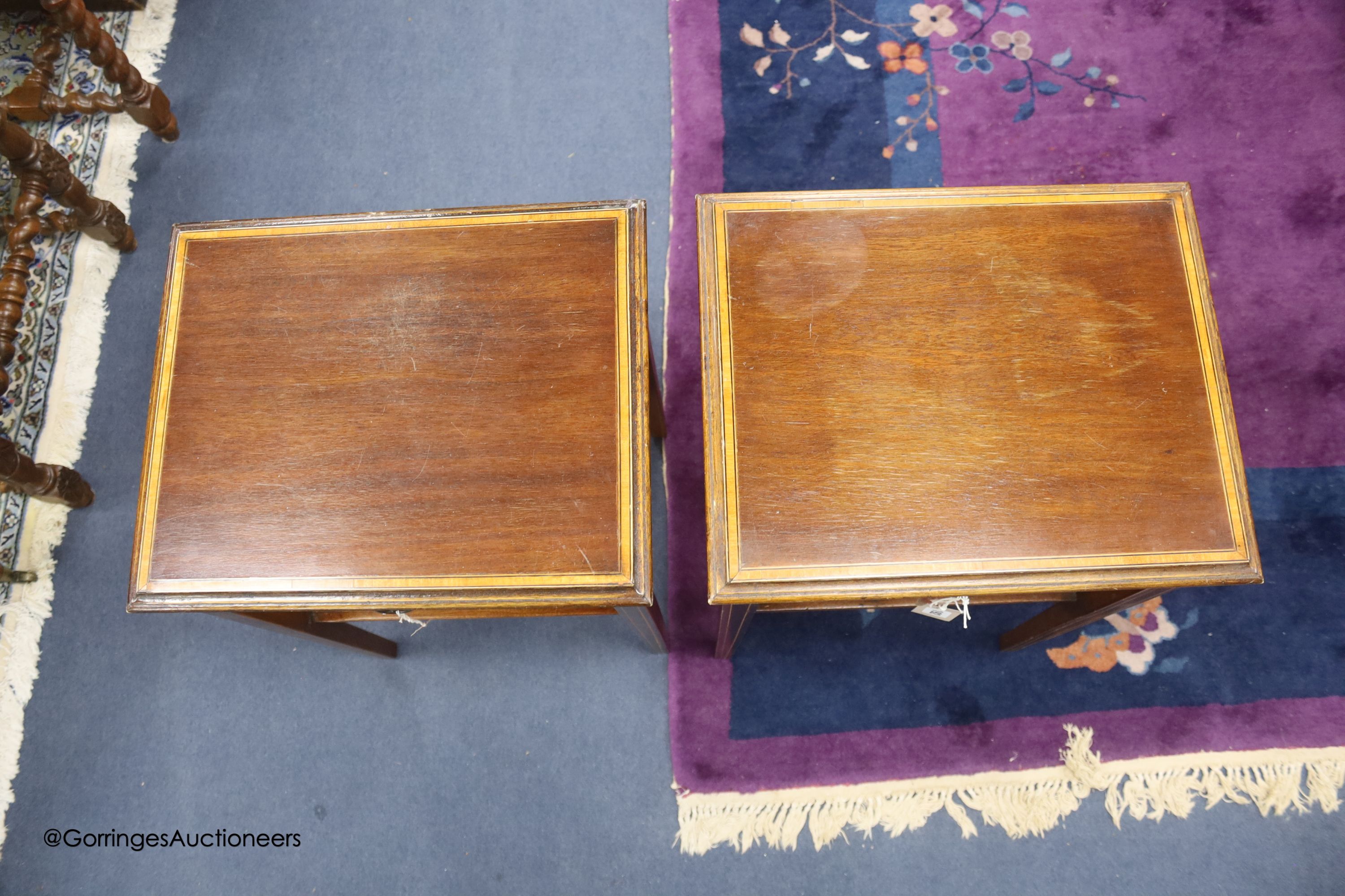 A pair of satinwood banded mahogany two tier tables, from Officer's Mess RAF Biggin Hill, sold by the Ministry of Defence, Feb 1994, width 41cm depth 33cm height 61cm